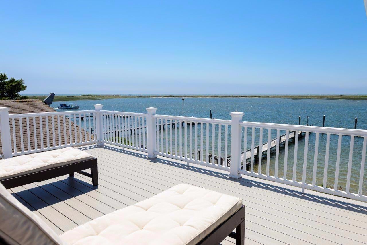 11 Riverside Way West Dennis, MA 02670 - Photo 17 of 25 a view of deck with a chair