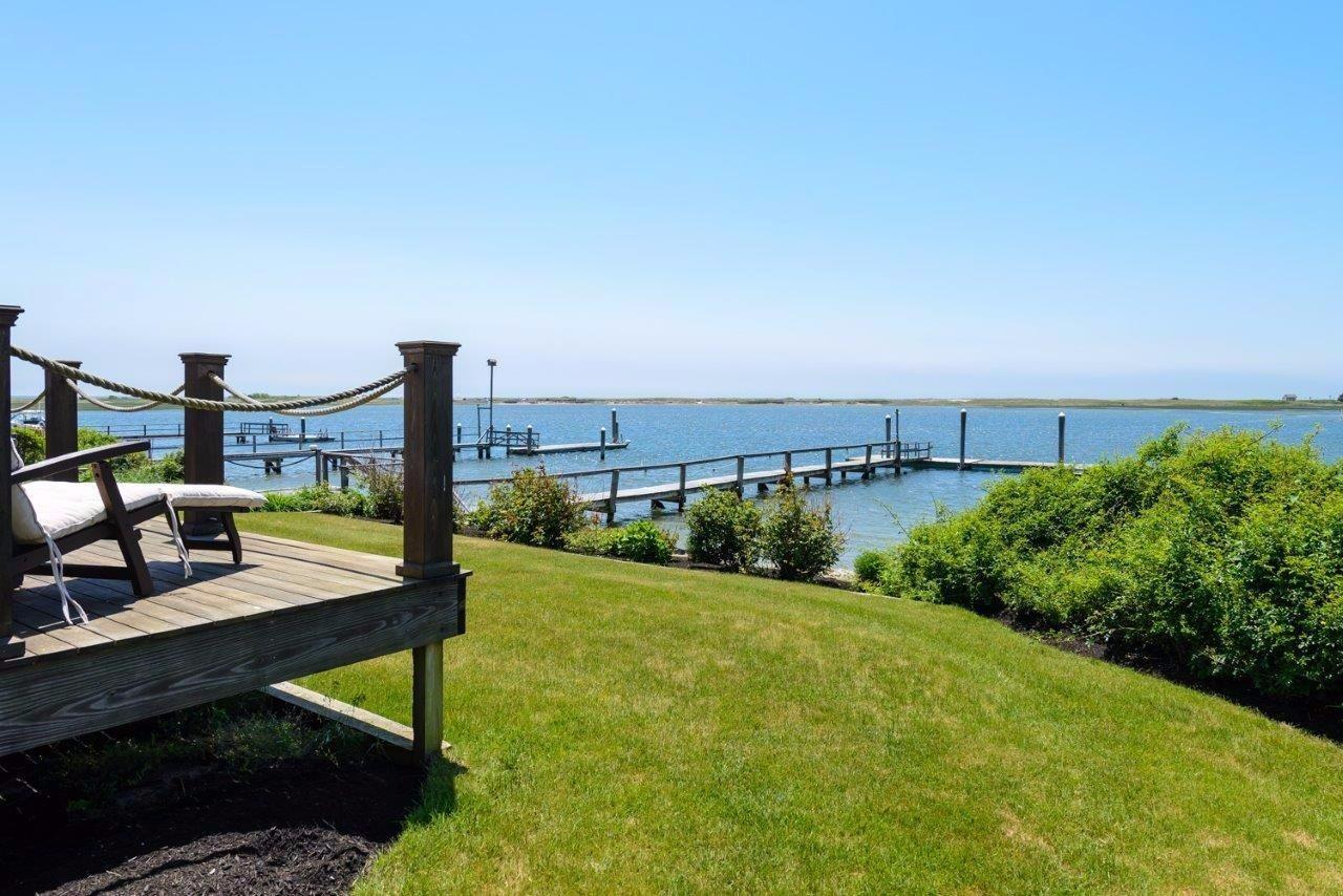 11 Riverside Way West Dennis, MA 02670 - Photo 24 of 25 a view of a bench in backyard of a building
