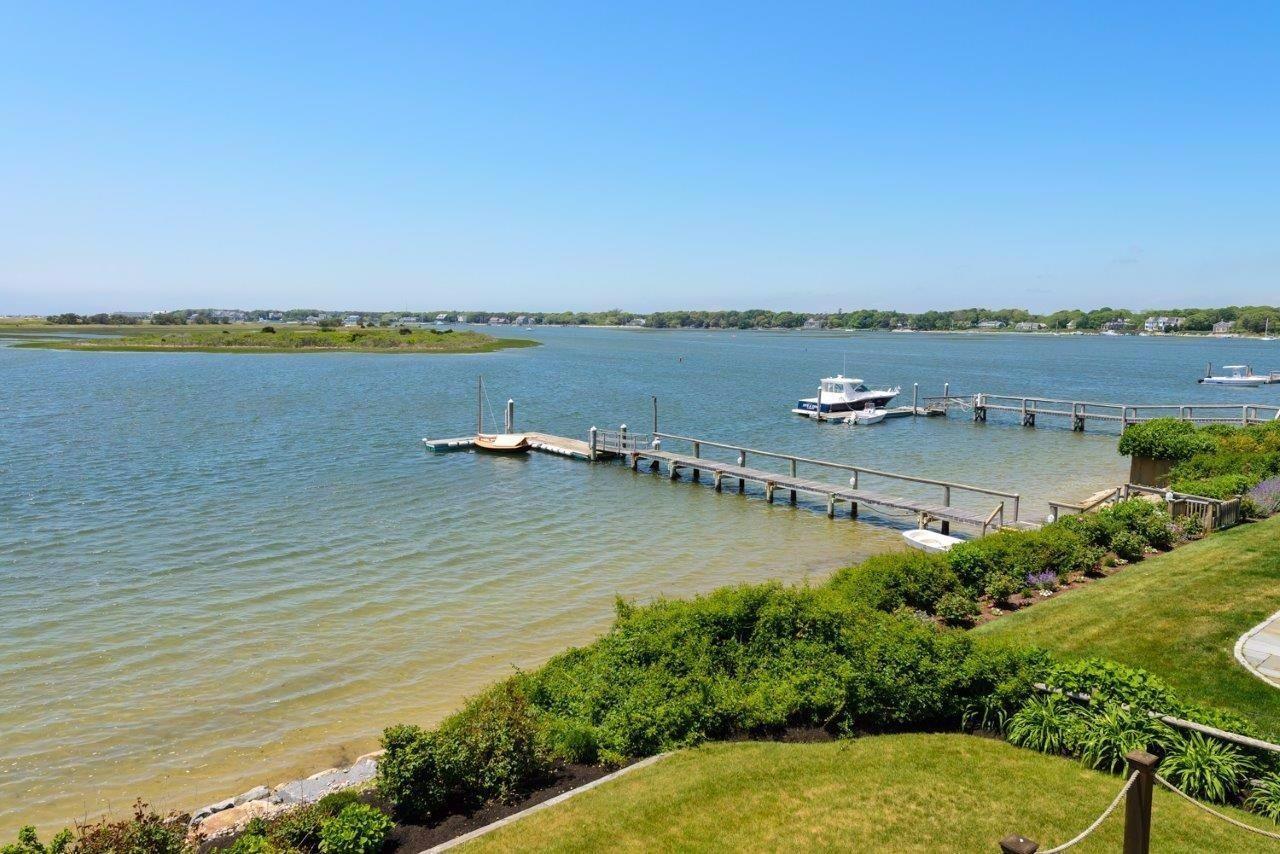 11 Riverside Way West Dennis, MA 02670 - Photo 5 of 25 an aerial view of a house with a lake view