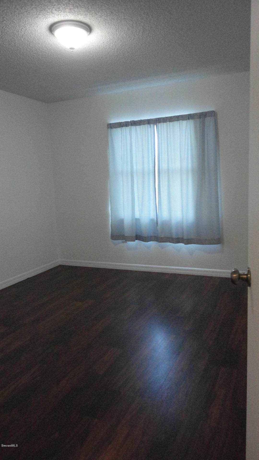 210 Spring Drive, Unit 3 Merritt Island, FL 32953 - Photo 8 of 15 DSC00842