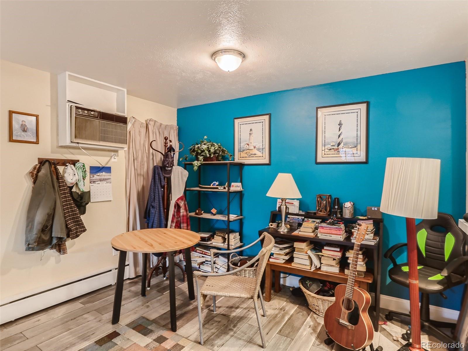 8060 Niwot Road, Unit 58 Niwot, CO 80503 - Photo 15 of 25 a room with furniture and a flat screen tv