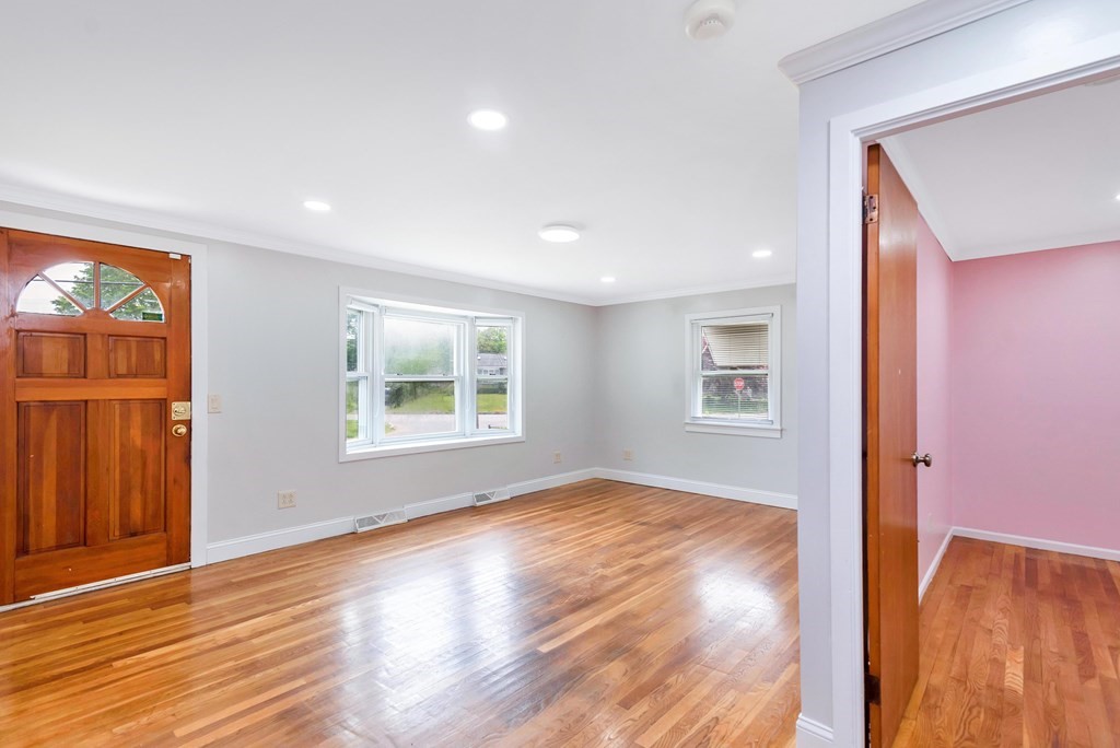 14 Scarsdale Road Springfield, MA 01129 - Photo 18 of 42 a view of an empty room with wooden floor and a window