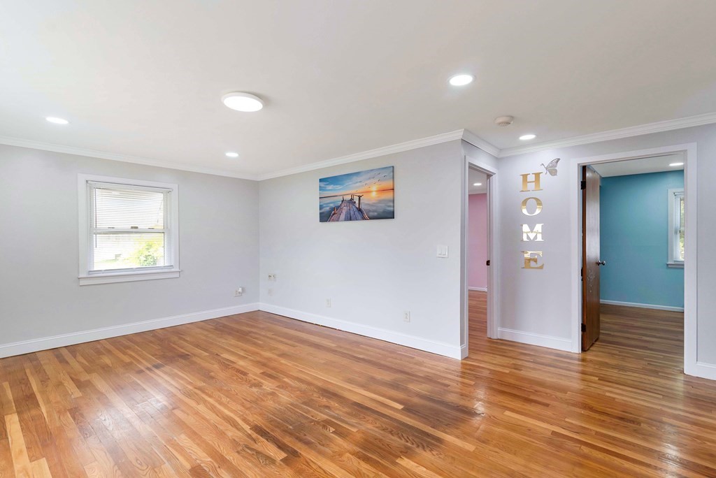 14 Scarsdale Road Springfield, MA 01129 - Photo 19 of 42 an empty room with wooden floor and windows