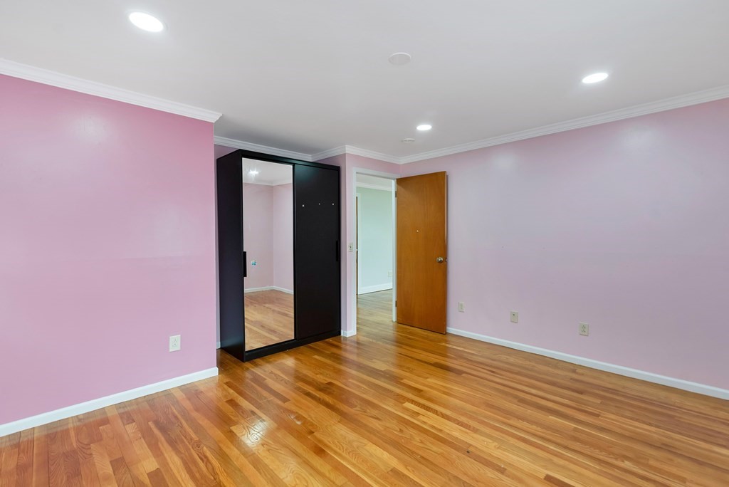 14 Scarsdale Road Springfield, MA 01129 - Photo 24 of 42 a view of an empty room with wooden floor