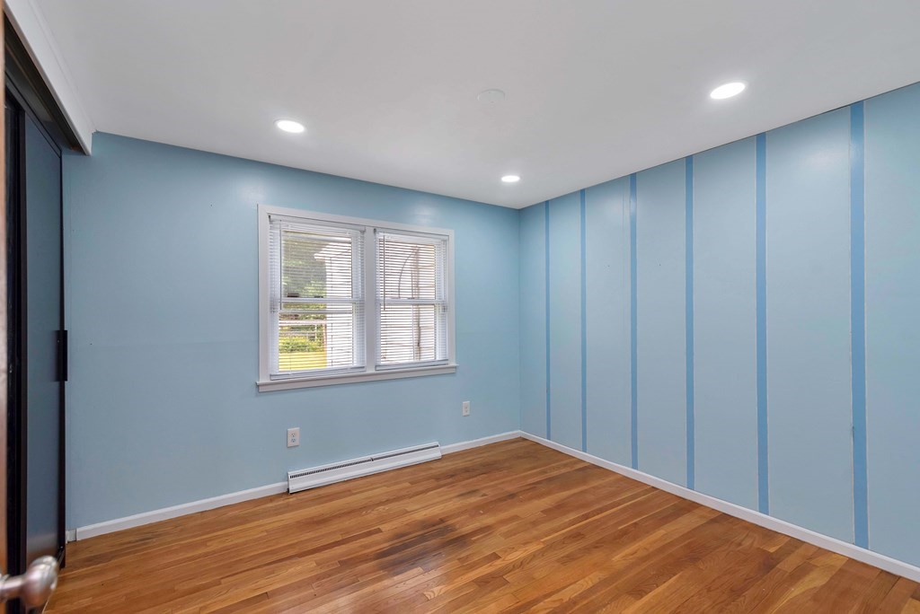 14 Scarsdale Road Springfield, MA 01129 - Photo 25 of 42 a view of empty room with wooden floor and fan