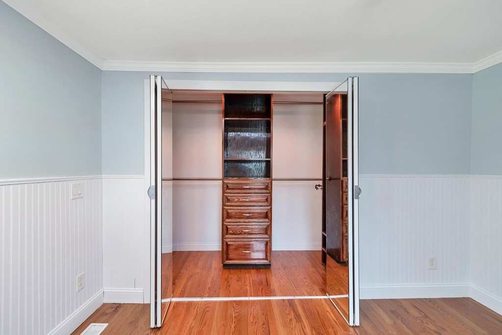 14 Scarsdale Road Springfield, MA 01129 - Photo 33 of 42 a view of walk in closet with empty racks