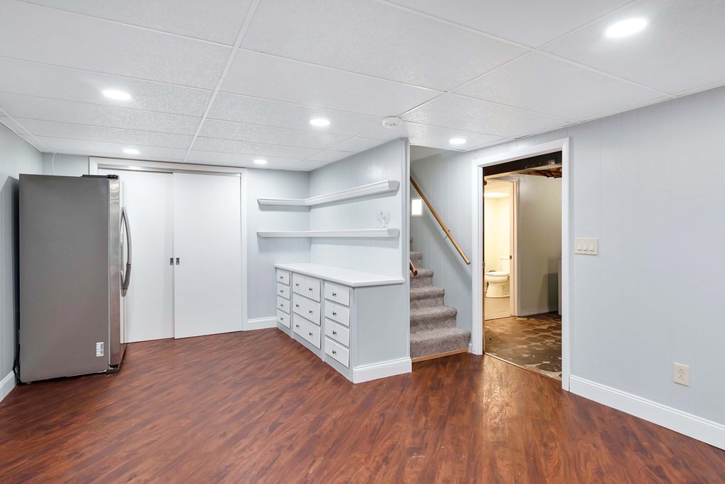 14 Scarsdale Road Springfield, MA 01129 - Photo 36 of 42 a view of an empty room with wooden floor and a window