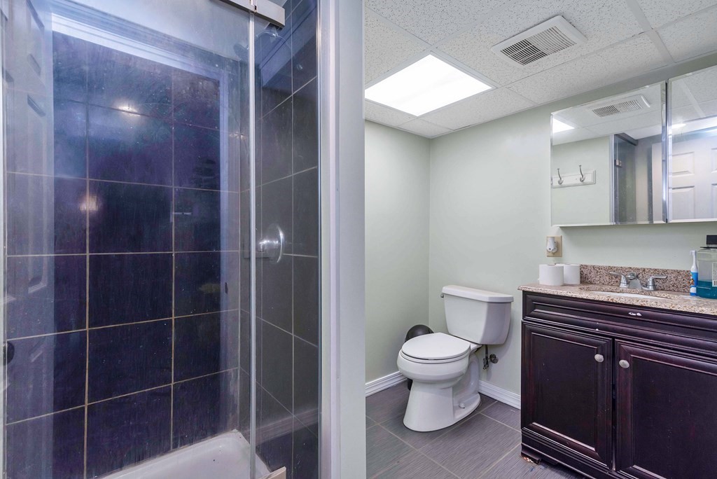 14 Scarsdale Road Springfield, MA 01129 - Photo 40 of 42 a bathroom with a toilet and a sink