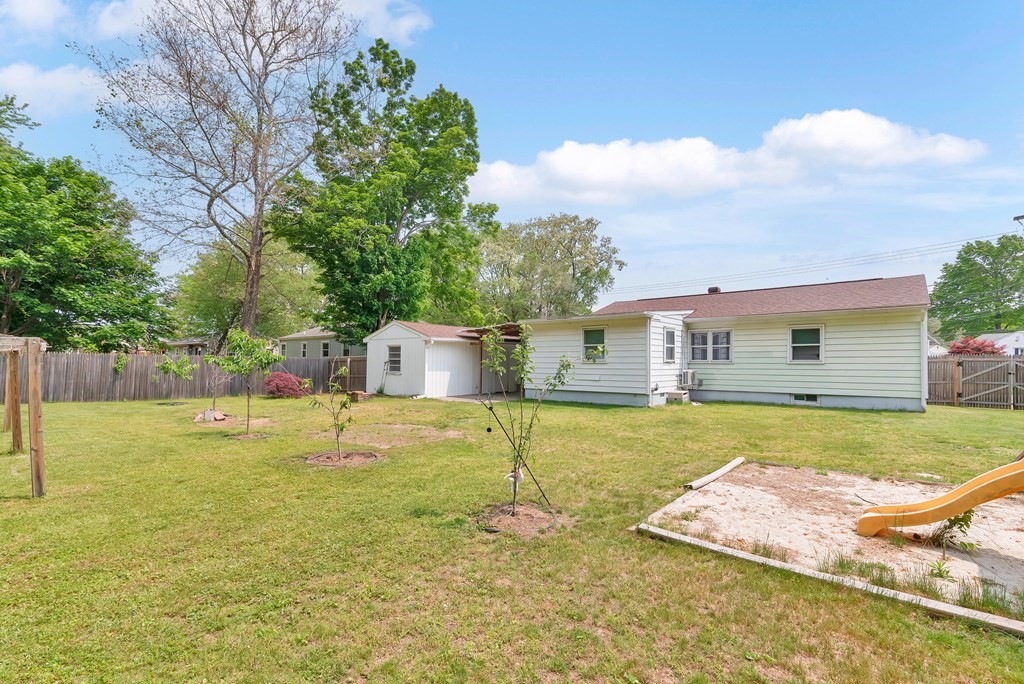 14 Scarsdale Road Springfield, MA 01129 - Photo 10 of 42 a backyard of a house with table and chairs
