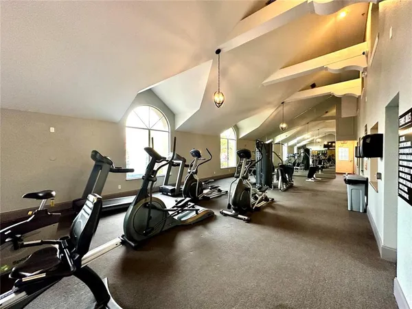a gym room with gym equipment