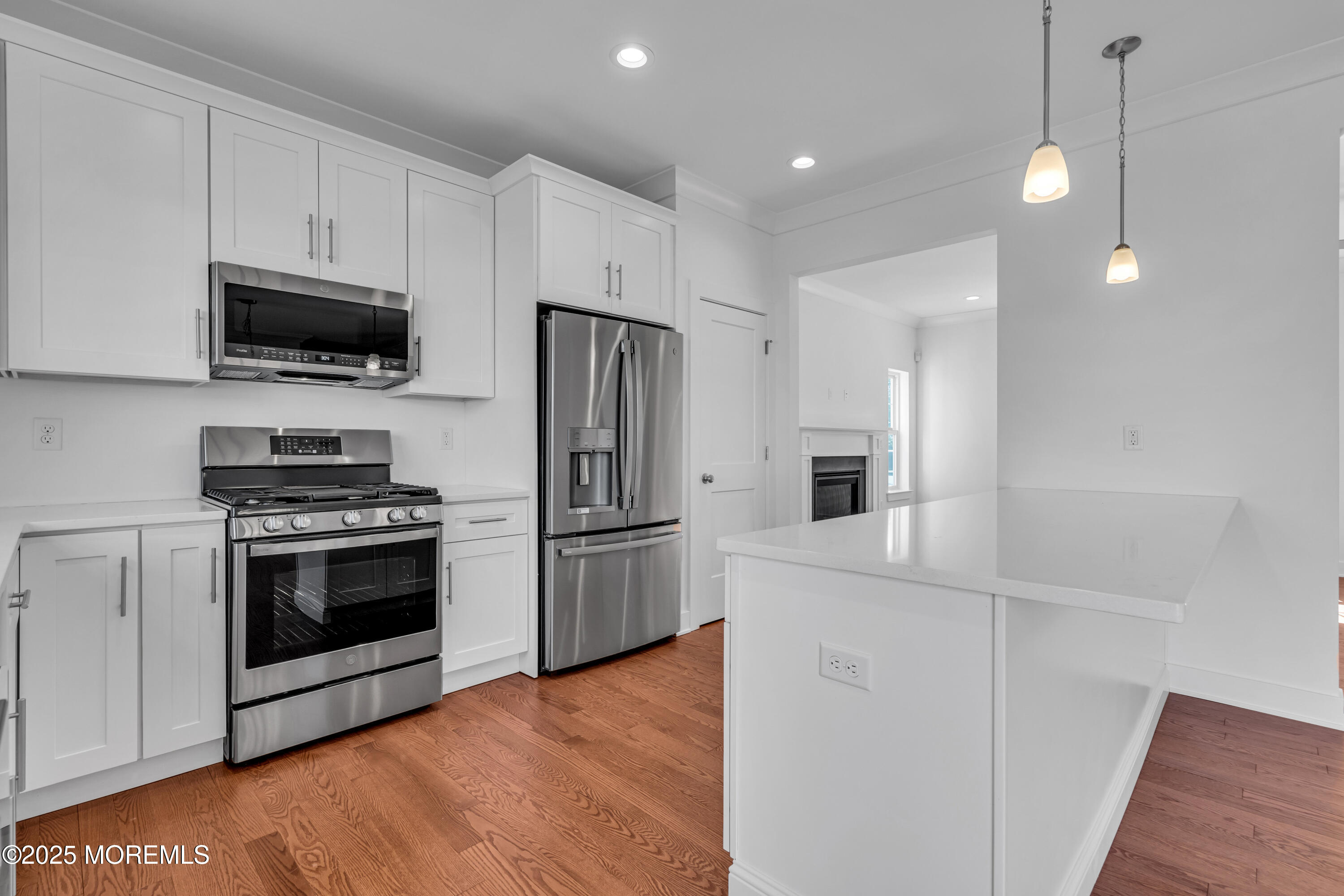 35 Pennsylvania Avenue Waretown, NJ 08758 - Photo 25 of 65 a kitchen with cabinets stainless steel appliances and wooden floor