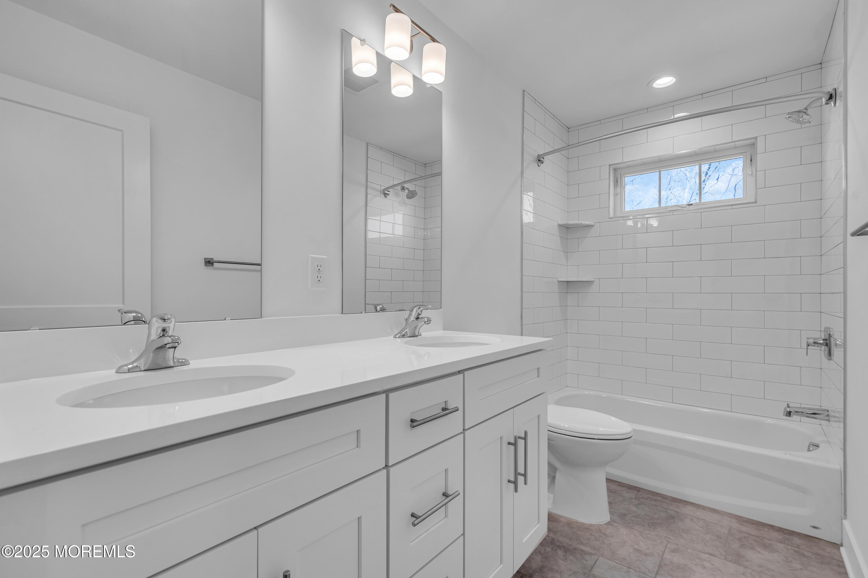 35 Pennsylvania Avenue Waretown, NJ 08758 - Photo 48 of 65 a bathroom with a sink double vanity granite tub and a mirror