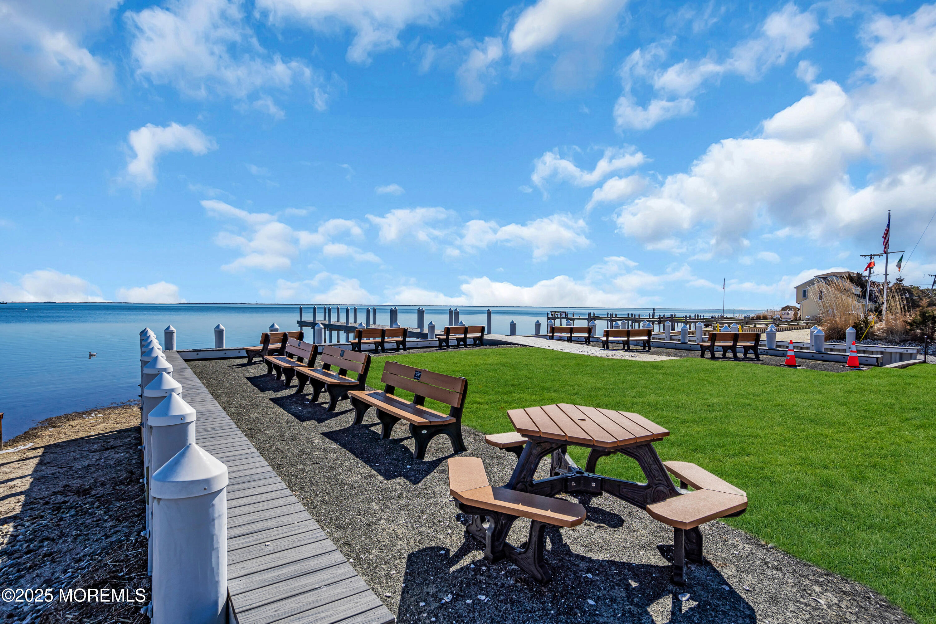 35 Pennsylvania Avenue Waretown, NJ 08758 - Photo 64 of 65 a view of a chairs and table on the deck