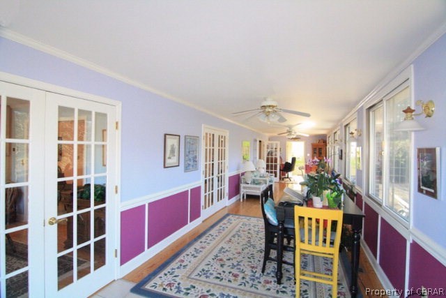 271 Burnt Wharf Road Lancaster, VA 22503 - Photo 16 of 35 a living room with furniture and a potted plant