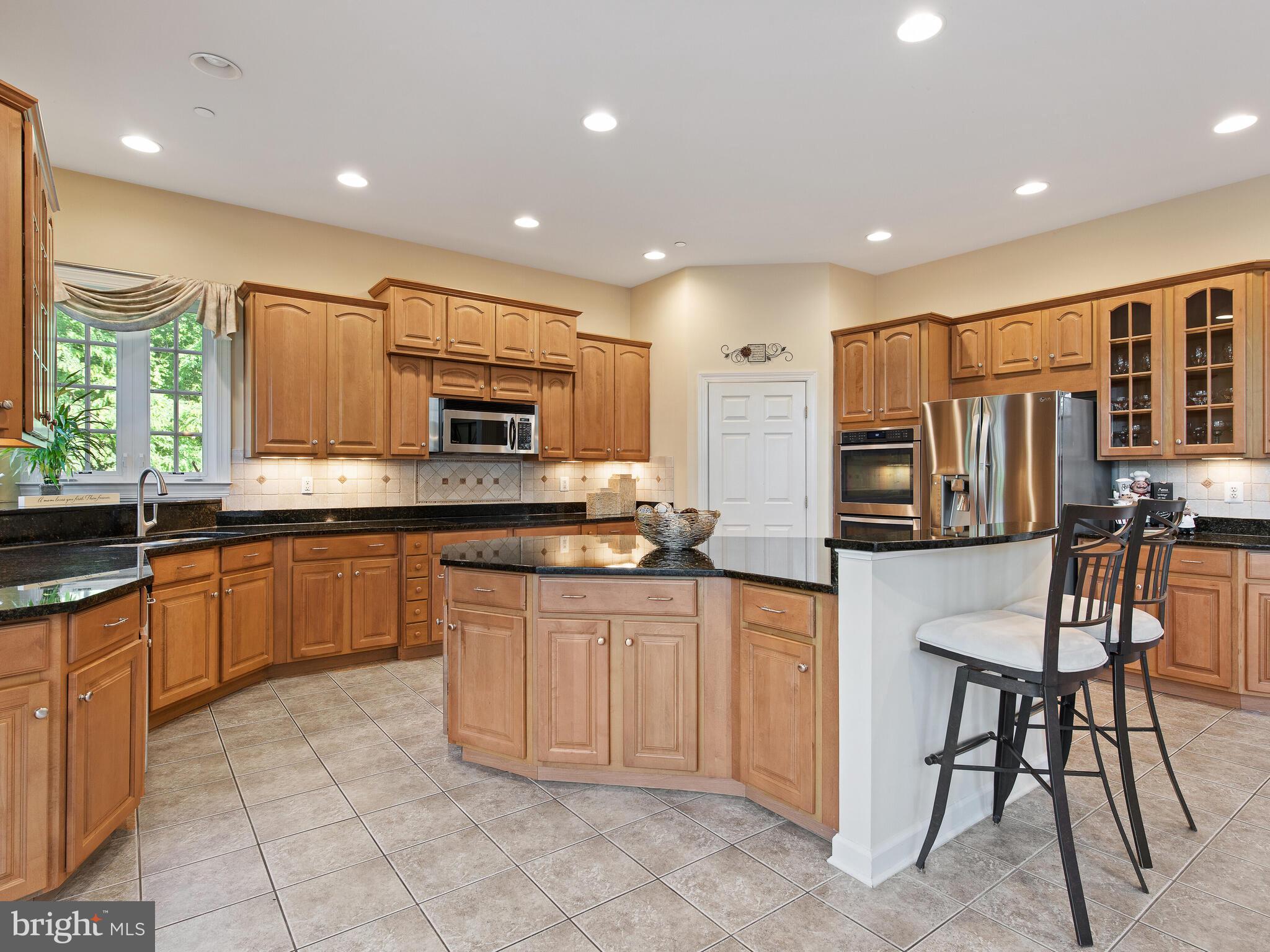 19 Schofield Road Phoenixville, PA 19460 - Photo 29 of 77 Large kitchen with island and stainless appliances