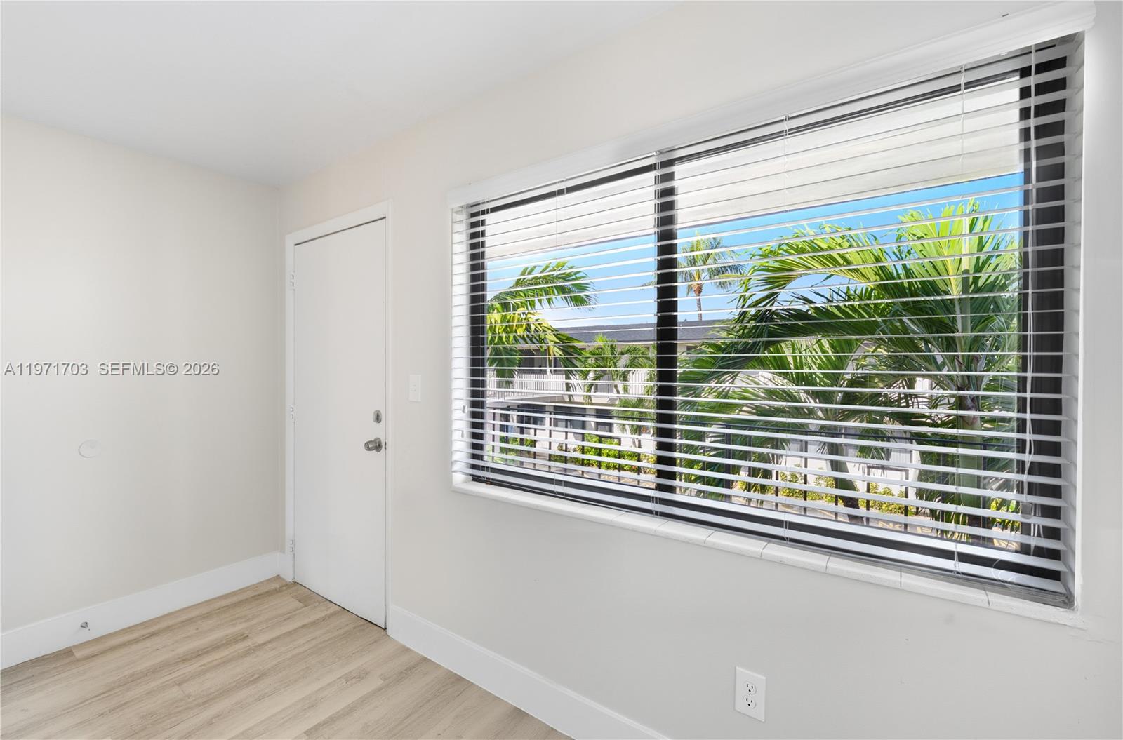 1330 West 29th Street, Unit 39 Hialeah, FL 33012 - Photo 9 of 17 a view of a room that has a large window