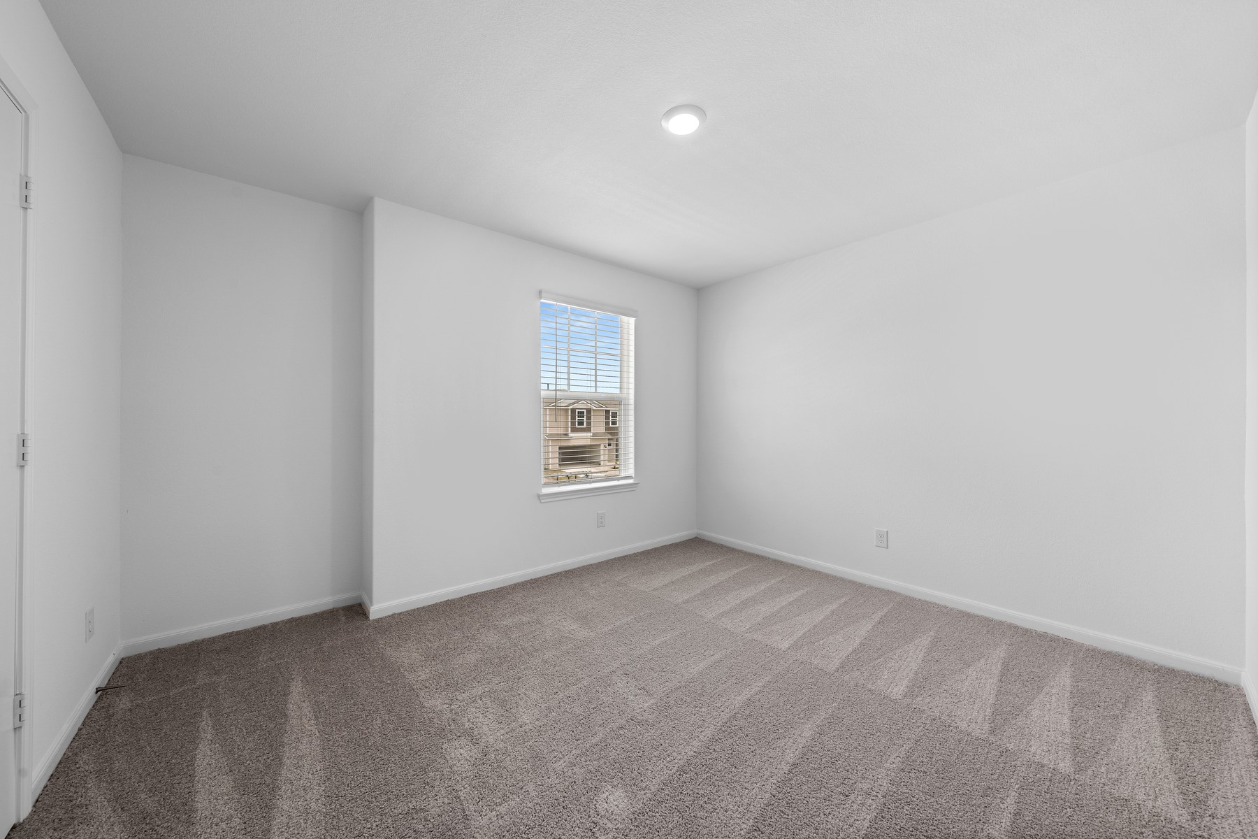 345 Silent Meadow Run Maxwell, TX 78656 - Photo 10 of 11 Carpeted spare room featuring baseboards