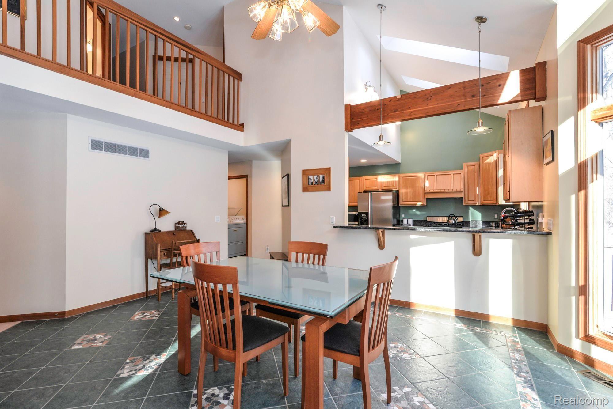 7844 Winans Lake Road Brighton, MI 48116 - Photo 9 of 38 Large Open Kitchen with Dining