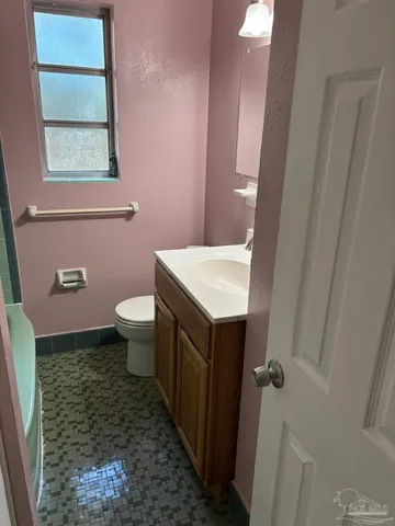 a bathroom with a sink and a toilet