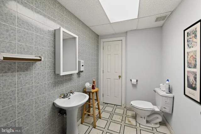 a room with furniture and a flat screen tv