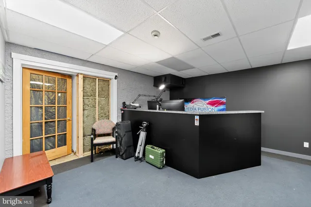 a view of a dining room with lots of furniture