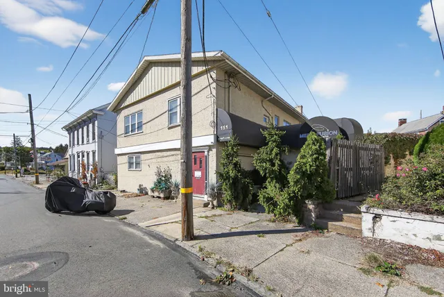 an aerial view of a city with lots of residential buildings