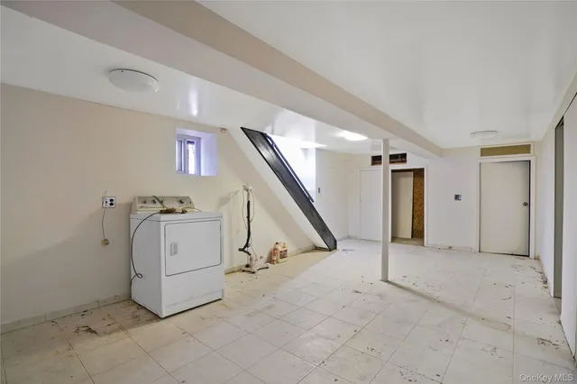 a view of a storage & utility room with washer and dryer