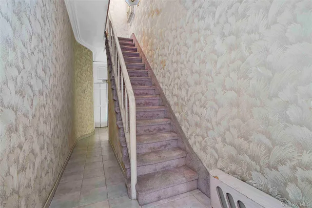 a view of a room with wooden walls