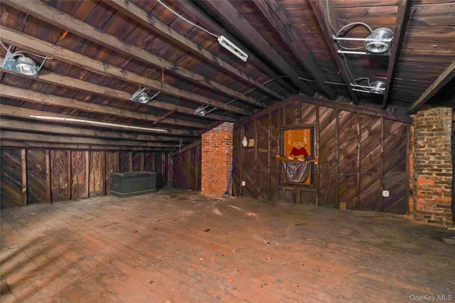 an aerial view of residential houses with city view