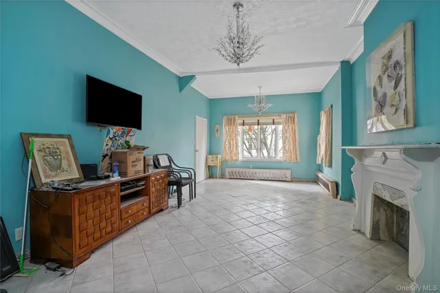 a workspace with fireplace cabinet and windows