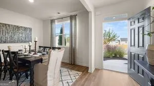 a kitchen with a sink and a refrigerator