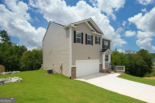 front view of house with a yard