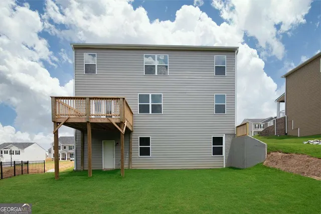 a kitchen with a sink appliances and cabinets