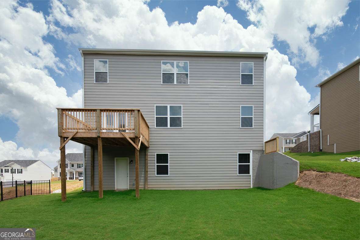 617 Lobelia Way Locust Grove, GA 30248 - Photo 10 of 44 front view of house with a yard