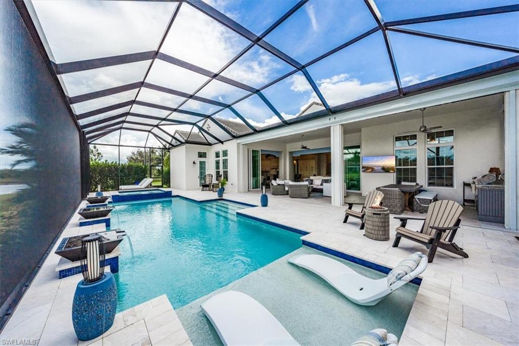 3181 Cullowee Lane Naples, FL 34114 - Photo 37 of 43 a view of swimming pool with outdoor seating