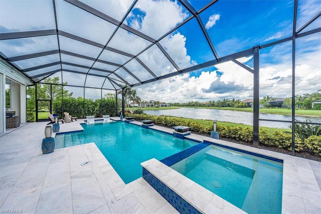 3181 Cullowee Lane Naples, FL 34114 - Photo 40 of 43 a view of swimming pool with a patio