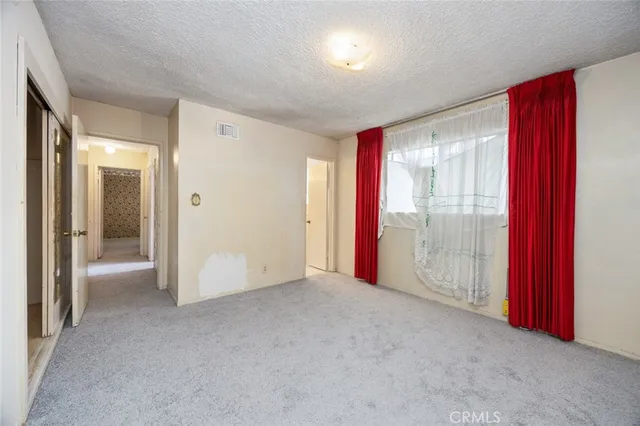 a view of a room with an entryway