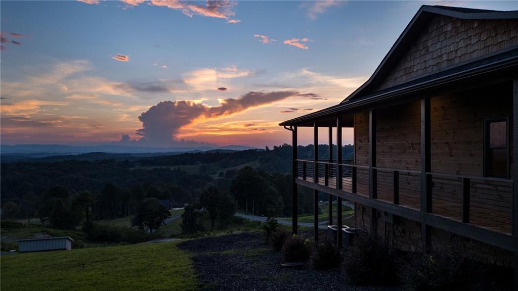 95 Upper Ridge Trail Blairsville, GA 30512 - Photo 2 of 71 a view of a balcony with a garden
