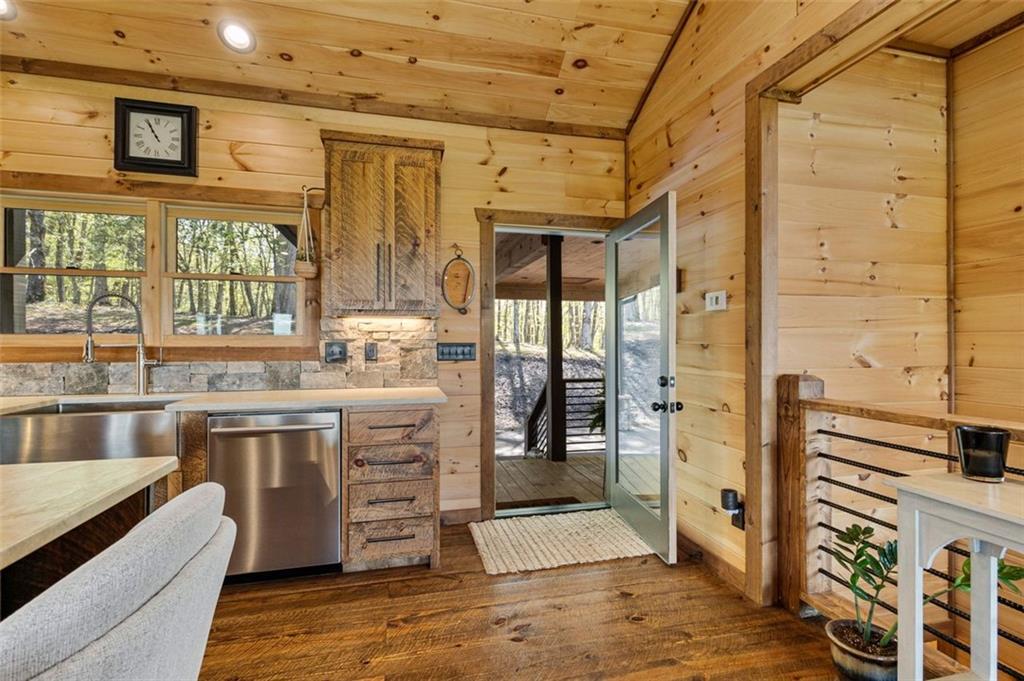 95 Upper Ridge Trail Blairsville, GA 30512 - Photo 22 of 71 a kitchen with stainless steel appliances granite countertop a stove and a refrigerator