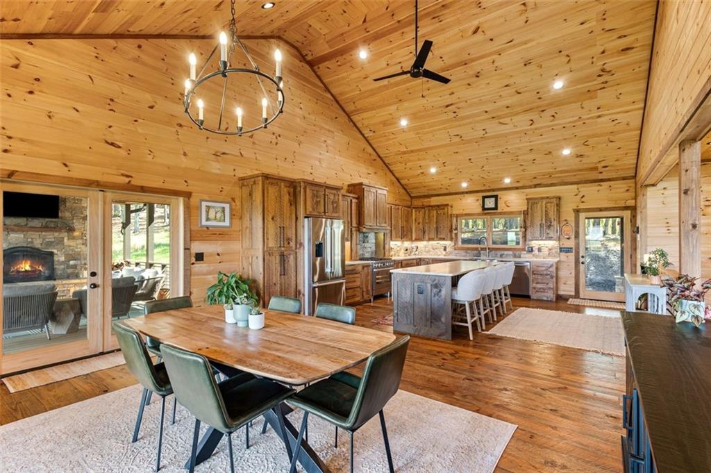 95 Upper Ridge Trail Blairsville, GA 30512 - Photo 30 of 71 a dining room with lots of wooden furniture