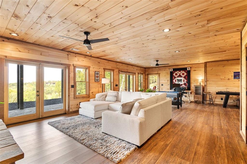 95 Upper Ridge Trail Blairsville, GA 30512 - Photo 49 of 71 a living room with furniture and wooden floor