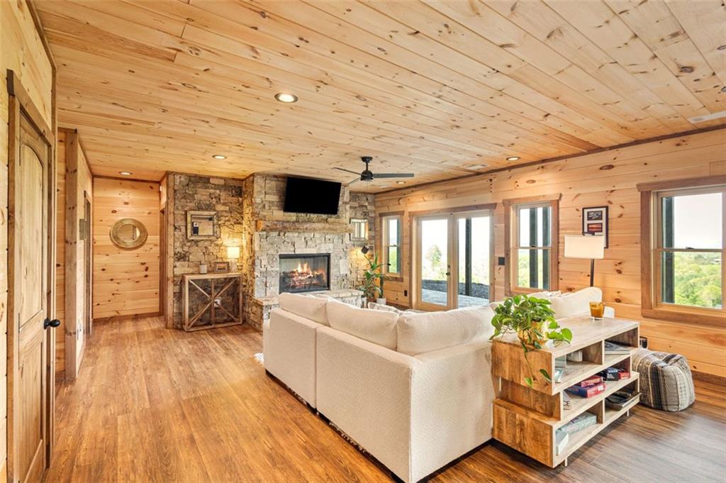95 Upper Ridge Trail Blairsville, GA 30512 - Photo 50 of 71 a living room with furniture fireplace and flat screen tv