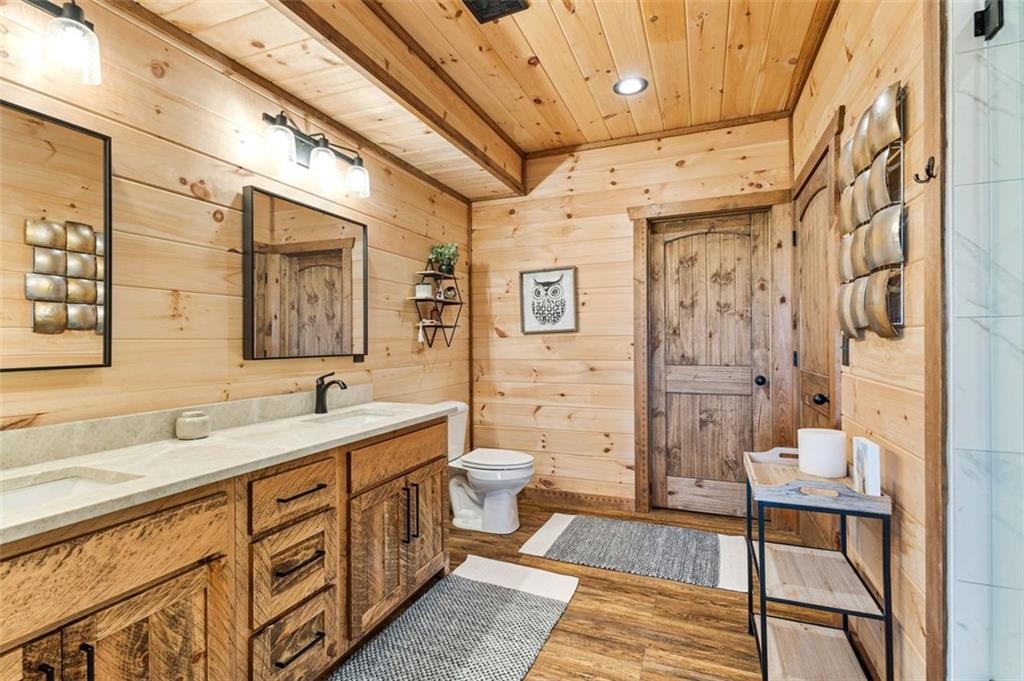 95 Upper Ridge Trail Blairsville, GA 30512 - Photo 55 of 71 a spacious bathroom with a double vanity sink mirror and toilet