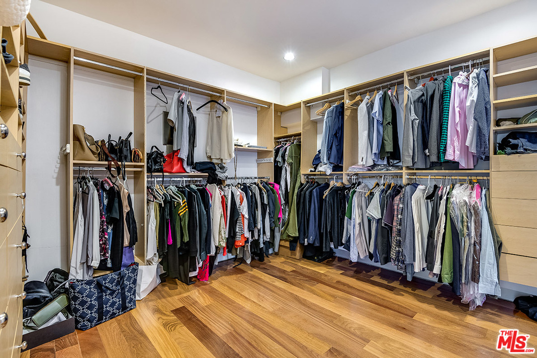 11458 Laurelcrest Road Studio City, CA 91604 - Photo 20 of 30 a view of walk in closet with clothes