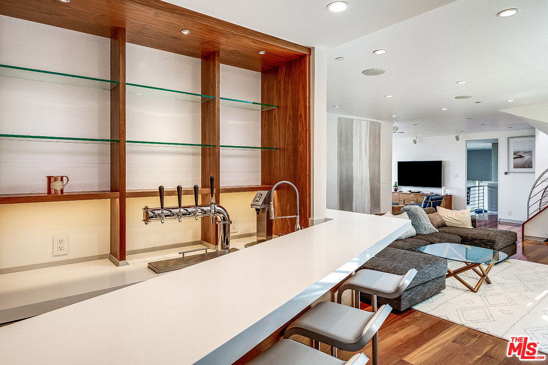 11458 Laurelcrest Road Studio City, CA 91604 - Photo 22 of 30 a dining room with a table and chairs