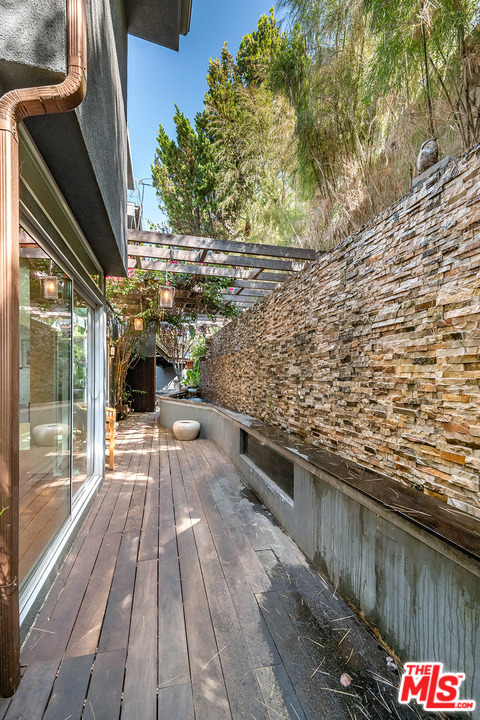 11458 Laurelcrest Road Studio City, CA 91604 - Photo 24 of 30 a view of balcony with wooden floor and outdoor space