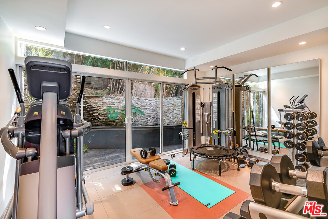 11458 Laurelcrest Road Studio City, CA 91604 - Photo 30 of 30 a room with gym equipment and a large window