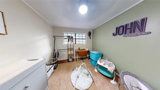 a bathroom with a sink mirror vanity and toilet
