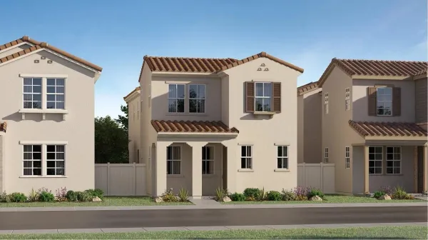 a front view of a house with a yard and parking space