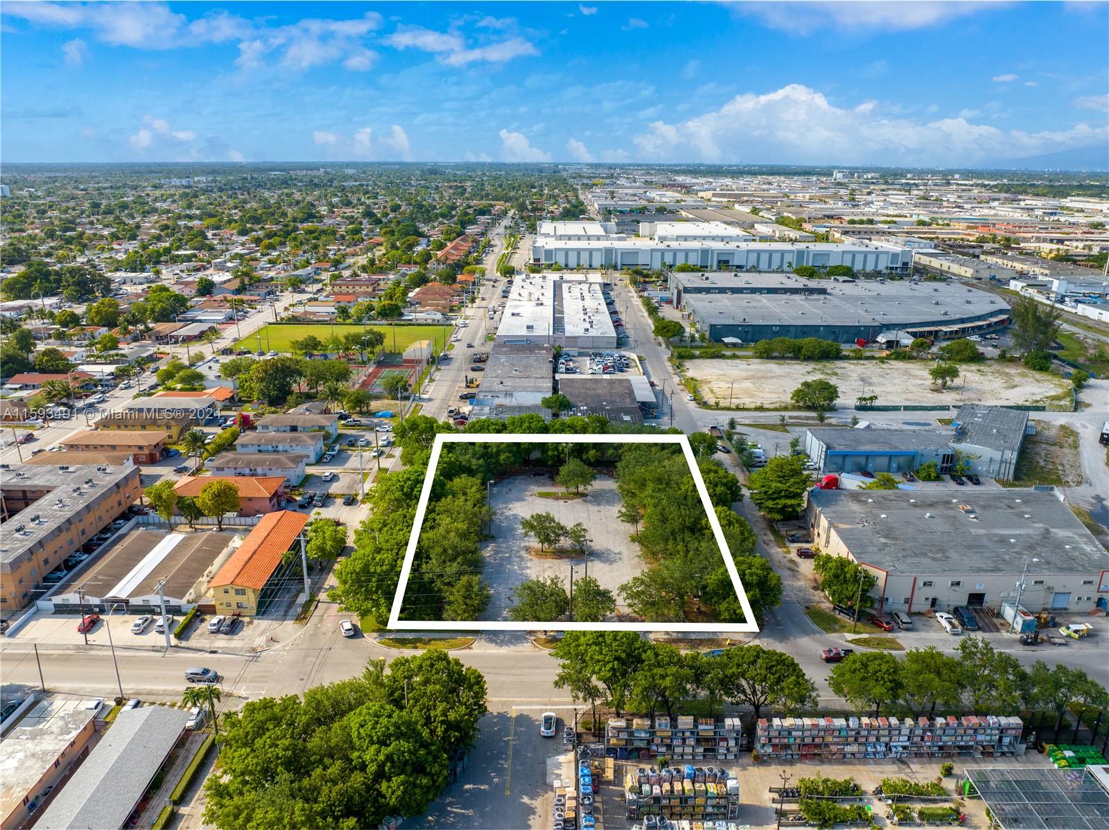 955 Southeast 12th Street Hialeah, FL 33010 - Photo 3 of 4 an aerial view of residential houses with outdoor space
